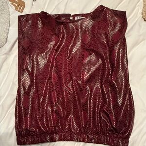 Maroon shoulder pad snake skin top